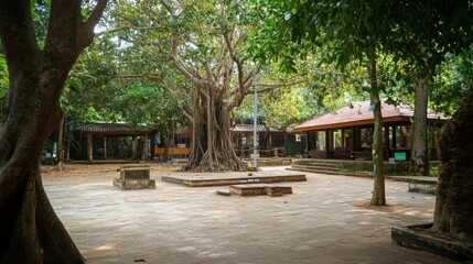 The serene beauty of Sai Ngam Banyan Tree, a sacred site covered with interwoven banyan trees.
