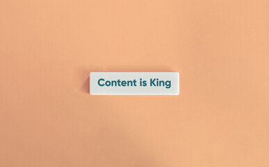Content is King Phrase. High-quality, Relevant, and Engaging content in Digital Marketing Strategy.
Text on Block Letter Tile on Dusty Pink Background. Minimal Aesthetic.