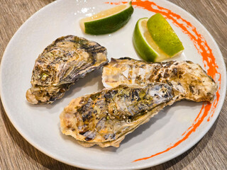 Fresh Oysters with Lemon at a Restaurant Buffet