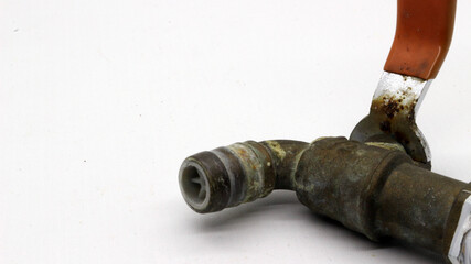 Broken and rusty water tap