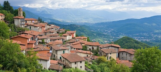 Obraz premium Scenic hillside village with stunning mountain views, countryside in Tuscan region of northern Italy