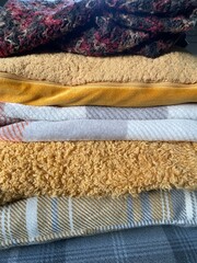 stack of blue and yellow fabric background