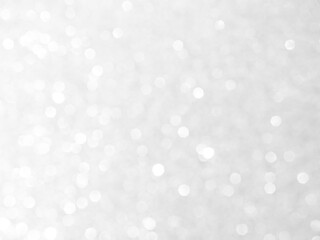 Background grey bokeh abstarct white beige circle light texture bubble blur pattern defocused glowing sparkle snow glitter snowflake magig backdrop ecosystem foreground card silver space decoration.