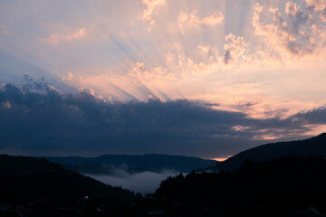 Mountain landscape with clouds and fog