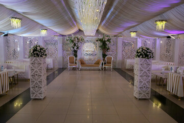 Beautiful wedding stage decorated with flowers, Wedding ceremony and decorations Stage for couple , wedding Event, Decor Concept, Engagement Decor
