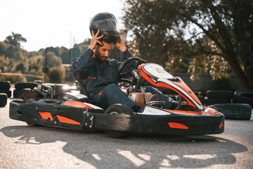 Wellness, free time. Man is outdoors, kart racing conception