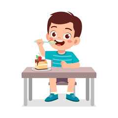 happy cute little kid eat a birthday cake