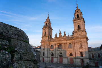 Cathedral of the fortified city of Lugo at sunset in a sunny day, Galicia, Spain.