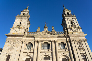 Cathedral of the fortified city of Lugo at sunset in a sunny day, Galicia, Spain.