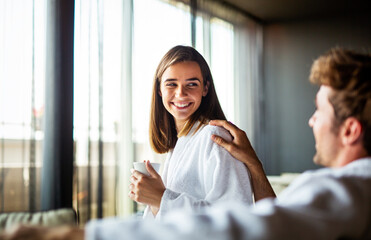 Couple enjoying wellness weekend and spa. Happy people relaxing and spending quality time together