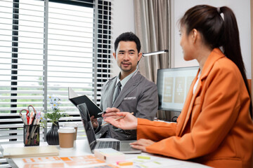 Obraz premium System Development Team Collaborating on UX UI Design in Modern Office Environment