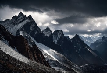 Obraz premium expansive mountain range beneath turbulent storm clouds showcasing majestic natural beauty, scenery, landscape, peak, nature, wilderness, elevation
