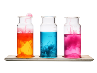 a group of glass vials with colored liquid