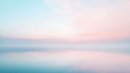 Fototapeta premium A soft gradient background with smooth transitions from pale pink to soft blue, creating a calming, abstract scene.