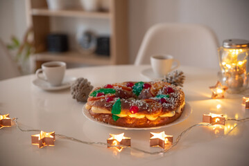 Table decorated to celebrate Three Kings' Day with its traditional king cake.