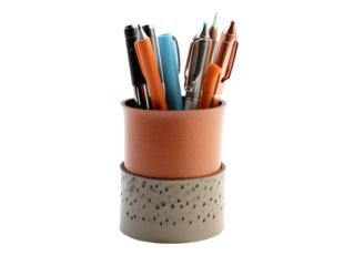 a cup with pens and pens in it