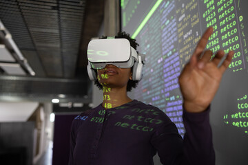 Coder testing VR headset at a technology conference