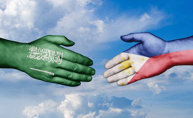 Philippines and Saudi Arabia country handshaking with flags, consensus concept international...