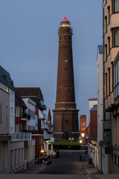 New lighthouse on the Island of Borkum, Lower Saxony, Germany at nightfall.
