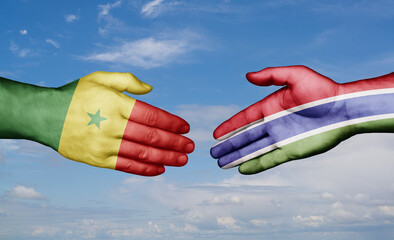 Gambia and Senegal country handshaking with flags, consensus concept international co-operation illustration