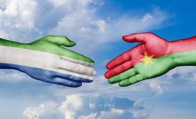 Burkina Faso and Sierra Leone country handshaking with flags, consensus concept international co-operation illustration