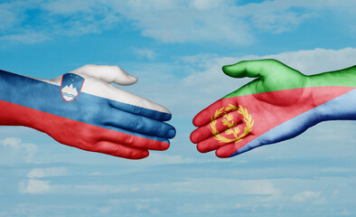 Eritrea and Slovenia country handshaking with flags, consensus concept international co-operation illustration
