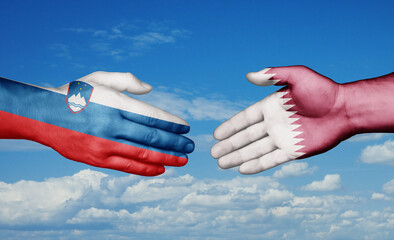 Qatar and Slovenia country handshaking with flags, consensus concept international co-operation illustration