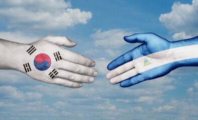 Nicaragua and South Korea country handshaking with flags, consensus concept international co-operation illustration