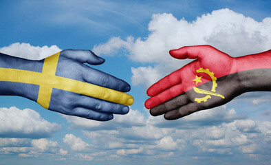 Sweden and Angola country handshaking with flags, consensus concept international co-operation illustration