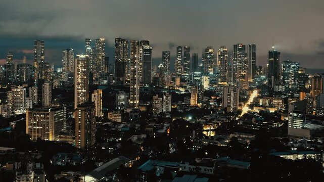 Timelapse of the Mumbai skyline at night, capturing the vibrant cityscape of Worli, Parel, and Dadar. Indian city at night. Developing India concept