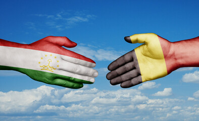 Belgium and Tajikistan country handshaking with flags, consensus concept international co-operation illustration
