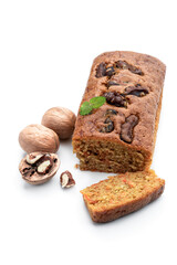 Homemade carrot and walnut loaf cake isolated on white