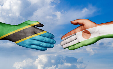 Niger and Tanzania country handshaking with flags, consensus concept international co-operation illustration