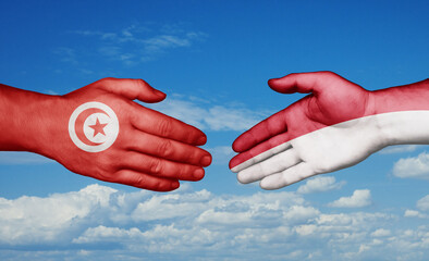 Indonesia and Tunisia country handshaking with flags, consensus concept international co-operation illustration