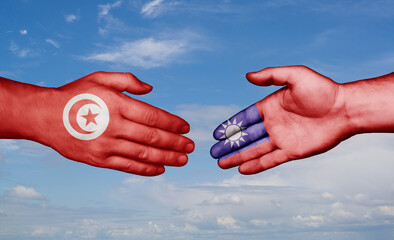 Taiwan and Tunisia country handshaking with flags, consensus concept international co-operation illustration