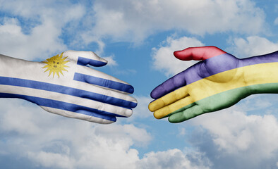 Mauritius and Uruguay country handshaking with flags, consensus concept international co-operation...