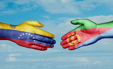 Eritrea and Venezuela country handshaking with flags, consensus concept international co-operation illustration
