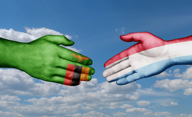 Luxembourg and Zambia country handshaking with flags, consensus concept international co-operation illustration