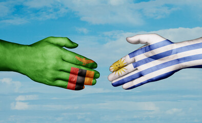 Uruguay and Zambia country handshaking with flags, consensus concept international co-operation illustration