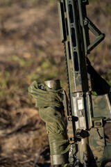 Arch weapon, carbine in camouflage colors for hunting outdoors.