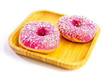 Two pink donuts on a white background