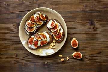 Fig sandwiches with cheese and honey for breakfast. Top view