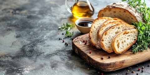 Rustic Bread Served with Olive Oil and Balsamic Vinegar on a Wooden Board with Herbs