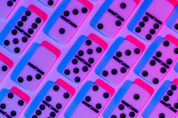 Nostalgic pattern of dominoes under neon lights