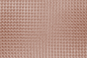 pink rose gold background, grid pattern. top view