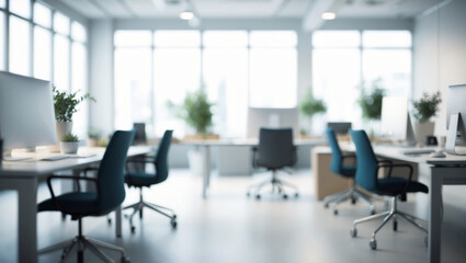 Modern office background with blurred desks, computers, and chairs, creating a bright, professional atmosphere with natural lighting and subtle decor elements.