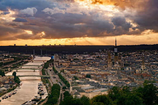 ROUEN, NORMANDY, FRANCE: aerial view of historic city center at sunset with Cathedral and bridges over the Seine river, from the viewpoint on top of "C&ocirc;te Sainte-Catherine"