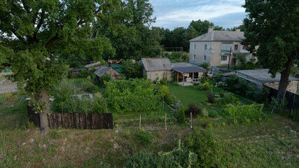 poor outskirts living district of third world country with barn shack buildings drone aerial...