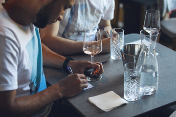 Blind wine tasting, Sommelier passes training for get the certification. Wine waiter school, winemaking lecture.