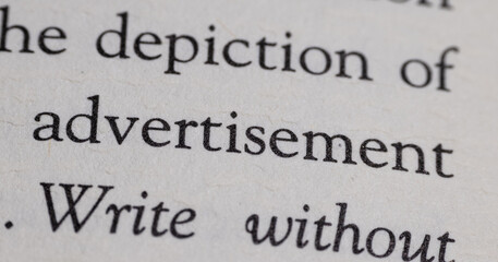 Obraz premium typography printing words text font in book on white paper textured surface macro photography close up foreshortening